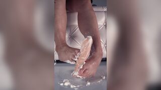 Rubbing your cock with my feet