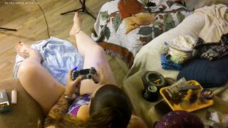 Roommate stands over me from behind and films down my blouse while I smoke and play video games