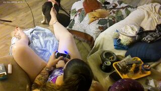 Roommate stands over me from behind and films down my blouse while I smoke and play video games