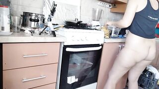Hairy brunette milf, big tits, sensual hairy woman in the kitchen.